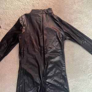 Skin tight faux leather zip up jumpsuit